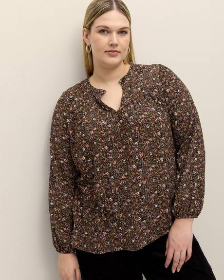 Haut fleuri en tricot texturé avec manches bouffantes