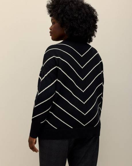 Pull noir à col rond avec mailles en angle