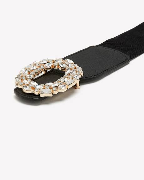 Ceinture élastique noire avec boucle ovale ornée de pierres