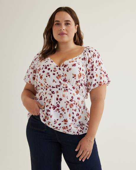 Blouse croisée imprimée avec manches ballon