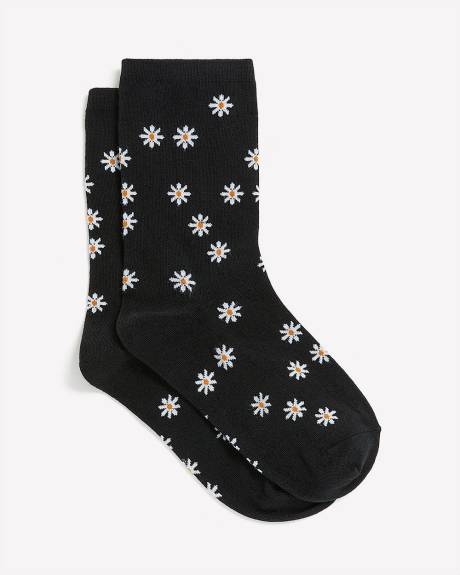 Chaussettes noires à imprimé de marguerites