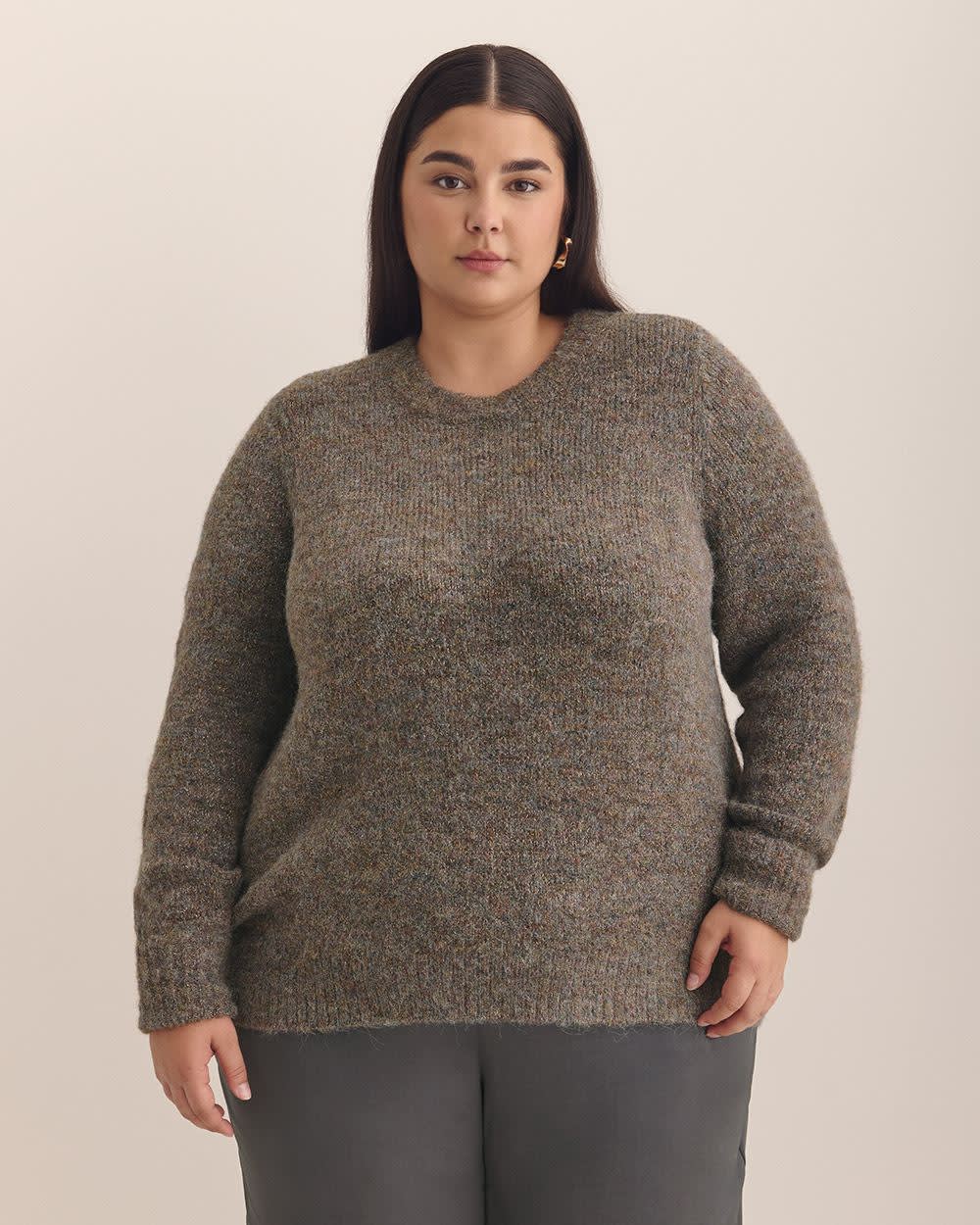 Pull noir à col rond et mailles métalliques