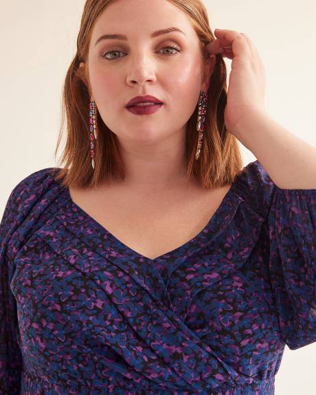 Robe à col en V croisé plissé
