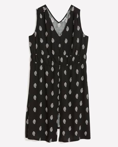 Robe boutonnée sans manches noire avec imprimé