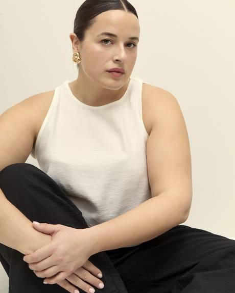 Blouse évasée sans manches avec boucle à nouer
