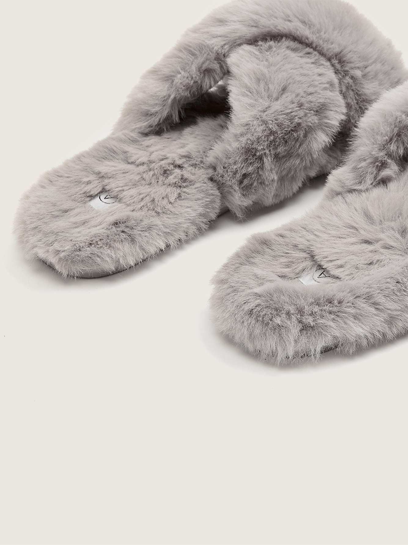 white fluffy cross over slippers