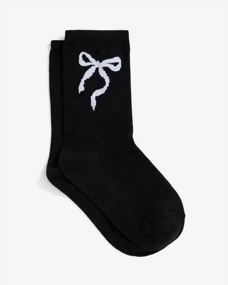 Chaussette noire avec boucle à la cheville