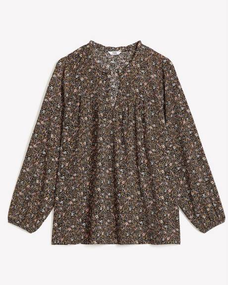 Haut fleuri en tricot texturé avec manches bouffantes