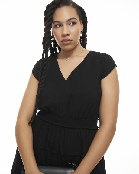 Black Tiered Midi Dress with High-Low Hem - Addition Elle
