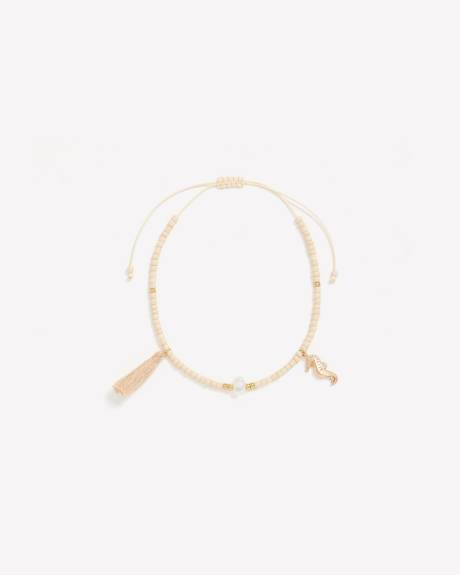 Offwhite Beaded Cord Bracelet with Seahorse Pendant