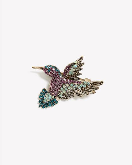 Broche en forme de colibri ornée de petites pierres