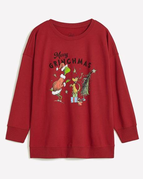 Pull rouge à col rond avec imprimé du Grinch