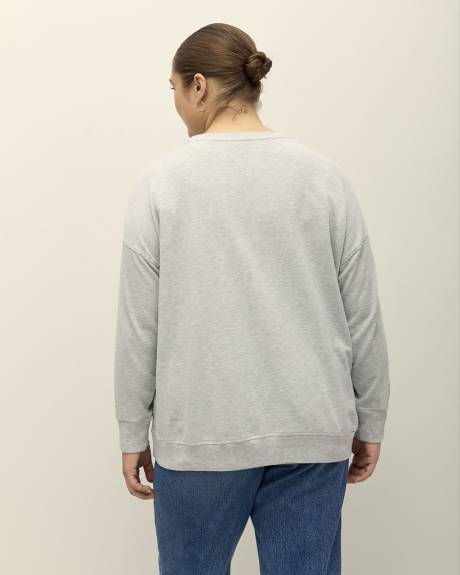 Pull gris chiné à col rond avec imprimé de Snoopy