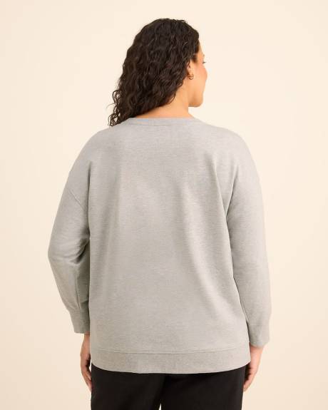 Pull gris à col rond avec imprimé de Snoopy des Fêtes