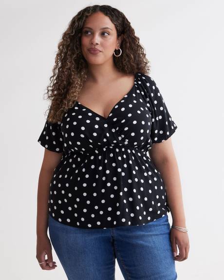 Blouse croisée imprimée avec manches ballon