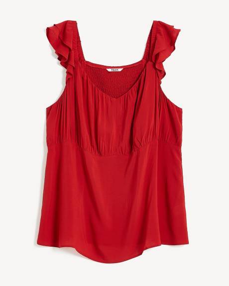 Blouse rouge avec manches à doubles volants
