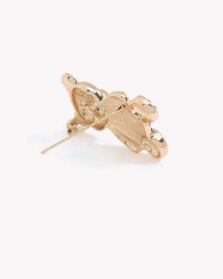 Broche dorée en forme d'ourson avec pierres scintillantes noires