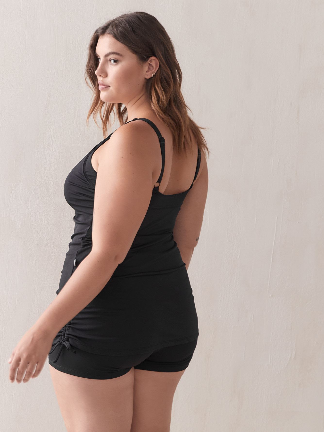 black one piece swimsuit with shorts