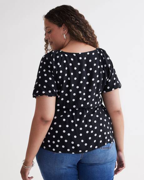 Blouse croisée imprimée avec manches ballon