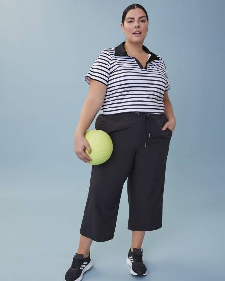 Polo rayé à manches courtes et encolure en V - Active Zone